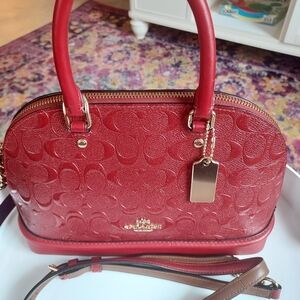 Coach embossed red satchel